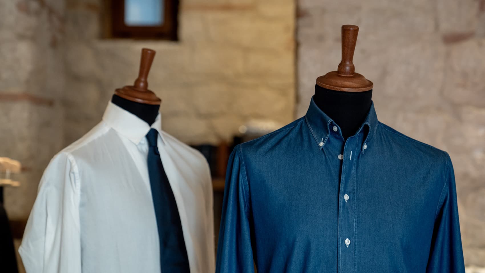 Shirts on tailoring forms inside the Caprice Bespoke atelier in Italy