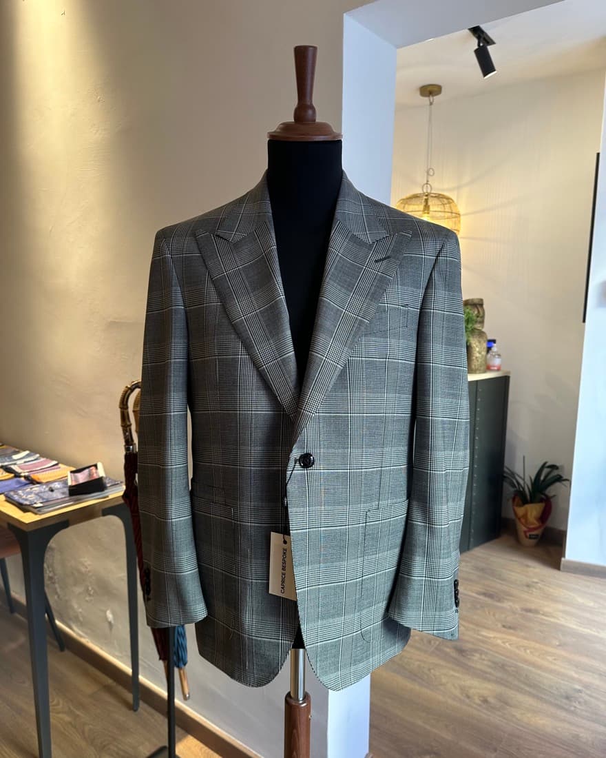 Glen-check jacket cut from mill-sourced Italian cloth on an atelier form
